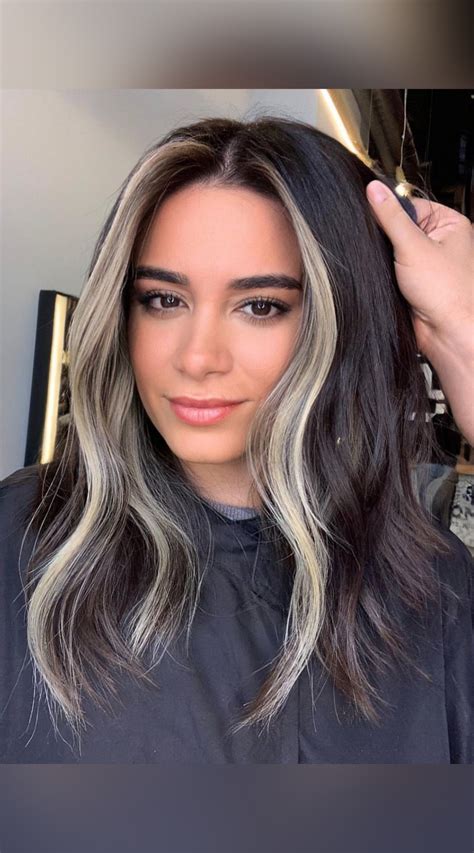 Just like caramel for a sweet treat on a cheat day, we love the way that these highlights blend effortlessly as the dark hair transitions into a lighter brown that is done so well, youd think it was a la natural. . Black hair with blonde highlights in front